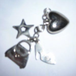 4 charms silvertone ,1 " each approx.